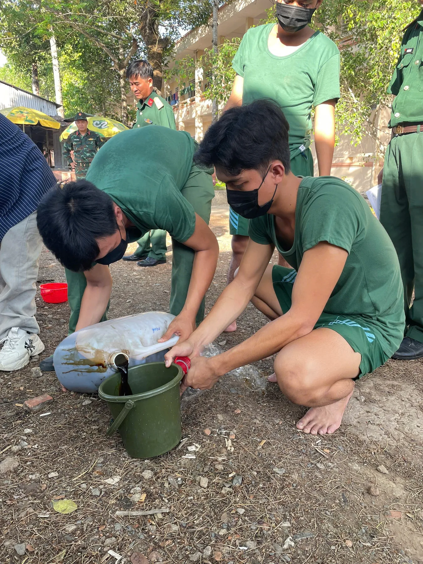 Field team preparing treatment during the Soc Trang pilot