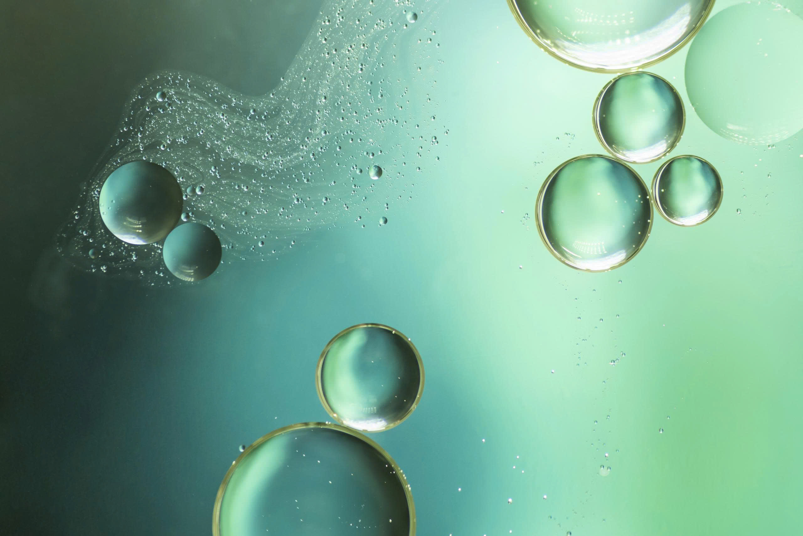 Abstract green biological cells representing data-driven biotechnology